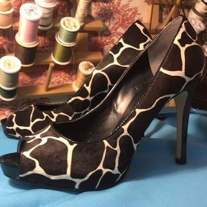 Giraffe print Nine West peep-toe heels.